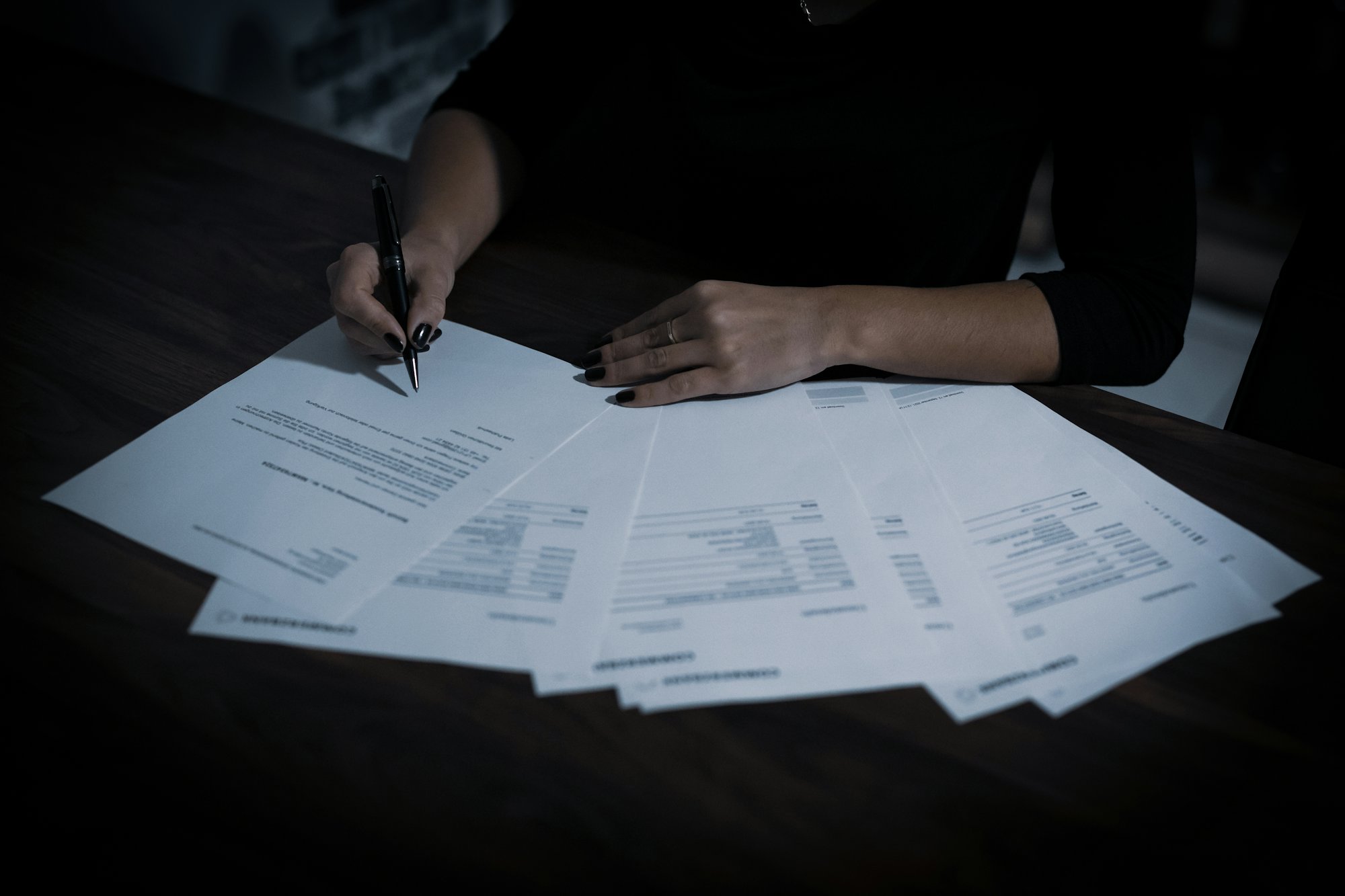 A lawyer examining and annotating documents